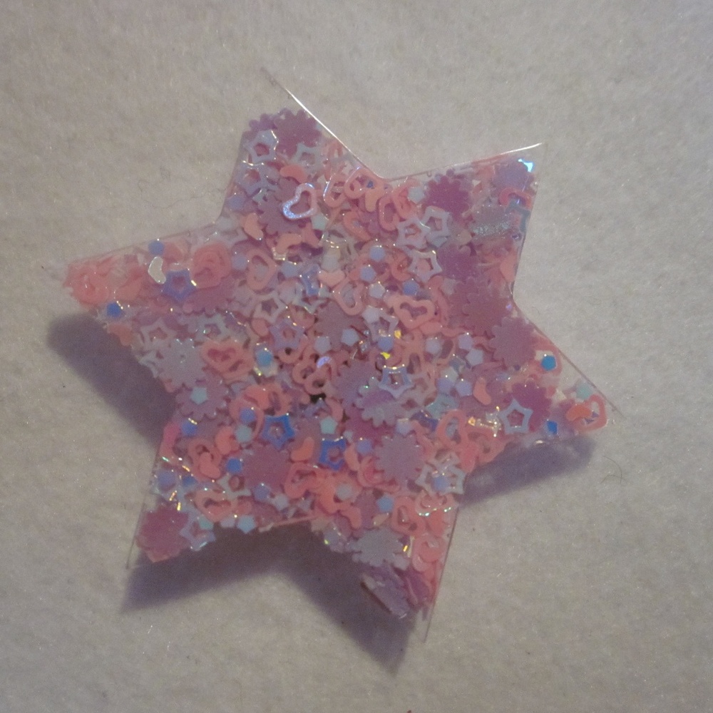 NWOT.  Confetti Star Magnet
